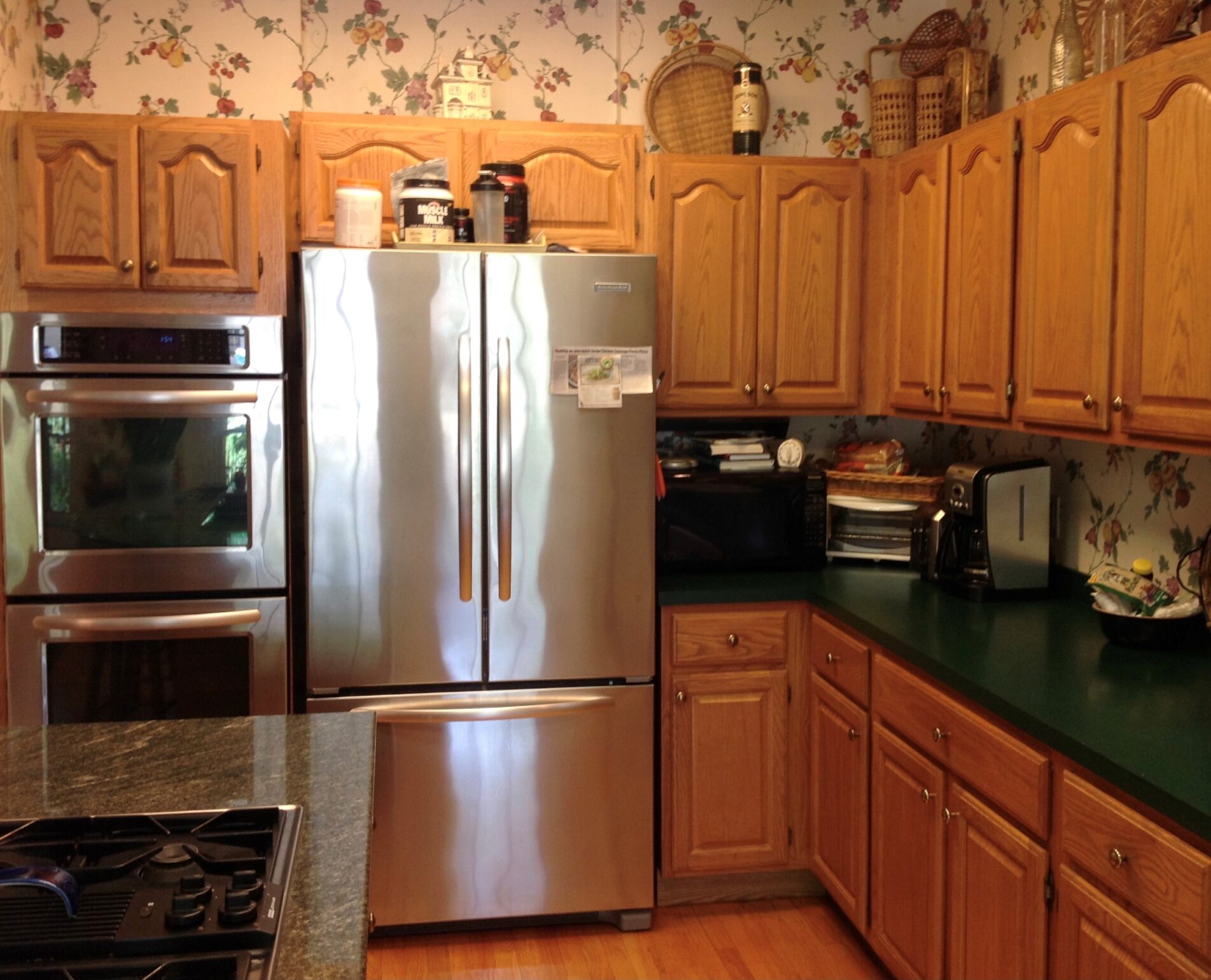 4 Innovative Ways to Decorate That Spot Above Your Fridge Tweak Your